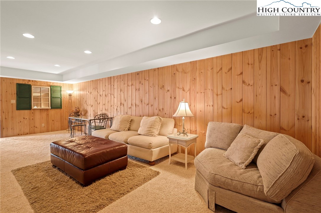 8015 Cloud Forest Lane Blowing Rock, NC 28605 - Photo 21 of 23 a living room with furniture