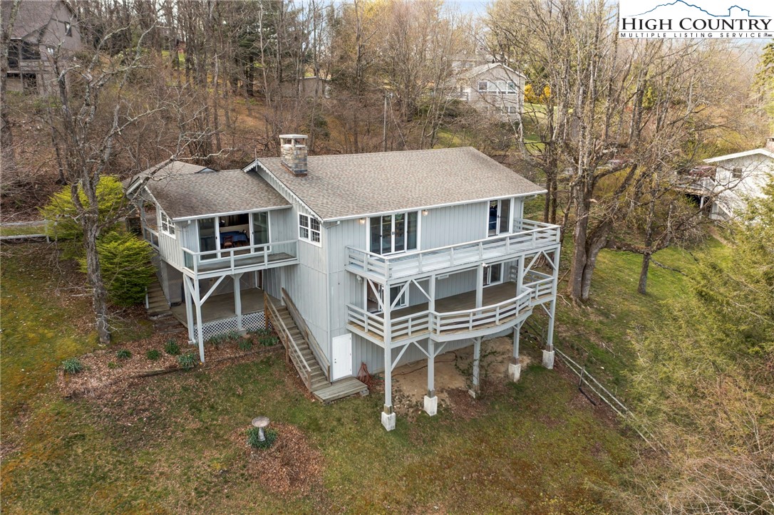 8015 Cloud Forest Lane Blowing Rock, NC 28605 - Photo 5 of 23 an aerial view of a house with a yard