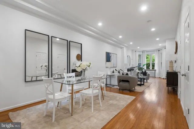 a kitchen with stainless steel appliances granite countertop a stove and a sink