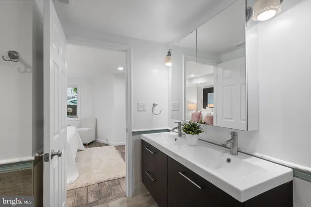 a view of a brick building next to a yard