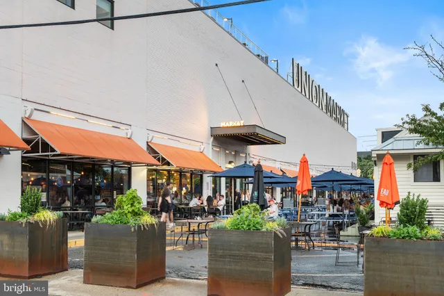 a view of a car park in front of a house