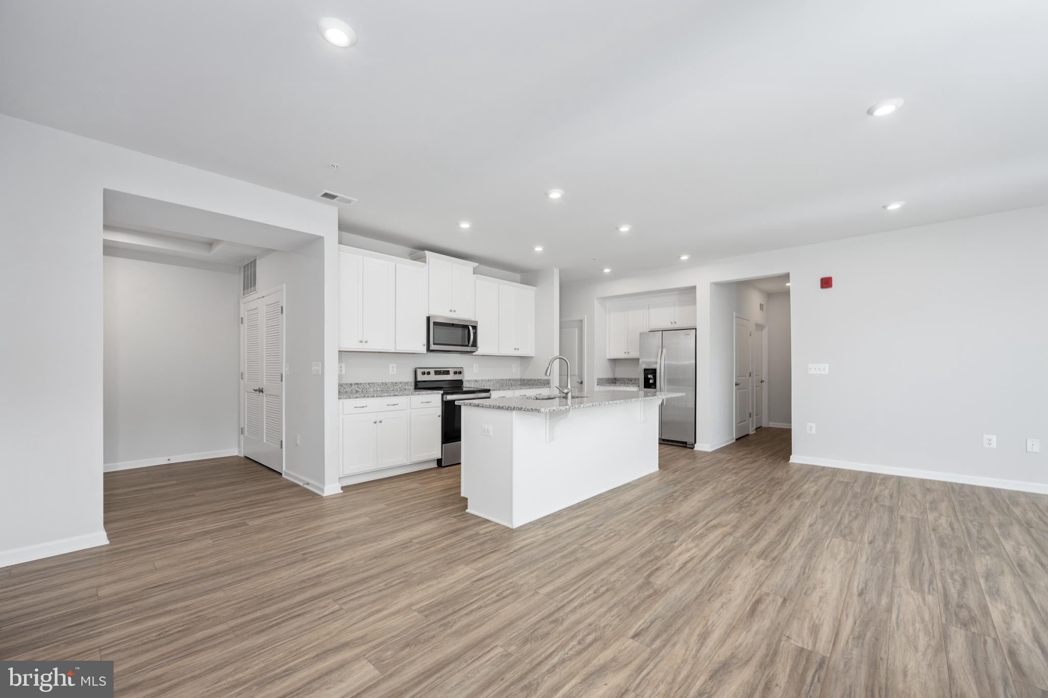 29 Hyssop Way, Unit 103 Stafford, VA 22554 - Photo 14 of 39 a view of kitchen with wooden floor