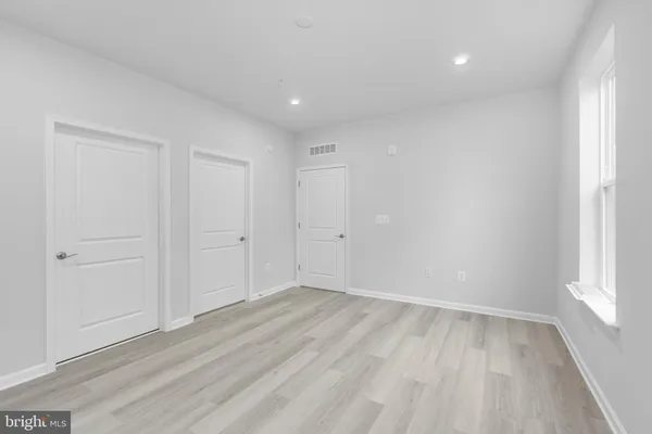 a view of a room with racks on the wall