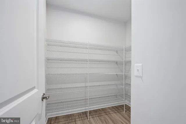 a view of small space with racks on the wall