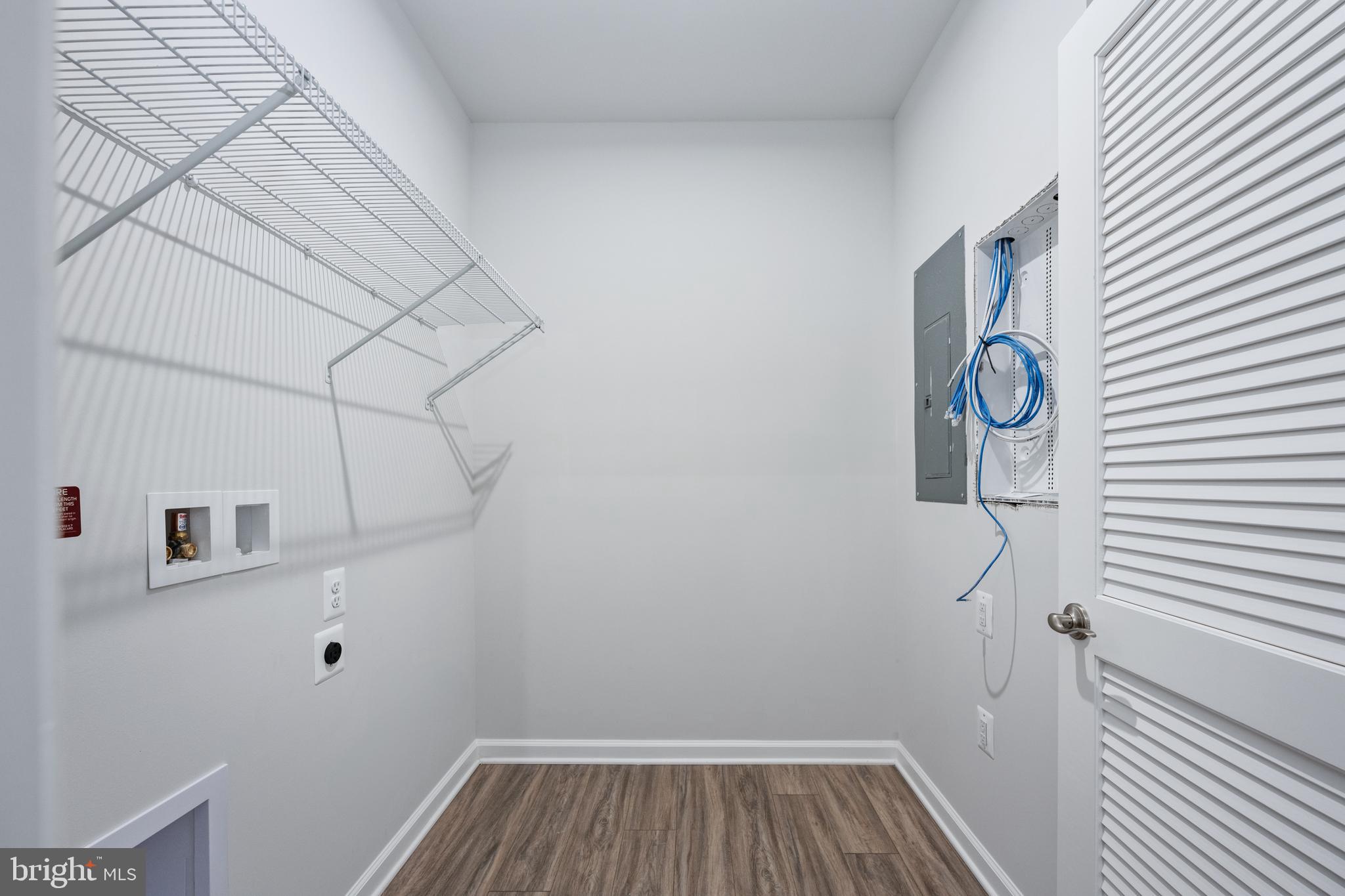 29 Hyssop Way, Unit 103 Stafford, VA 22554 - Photo 25 of 39 a view of small space with racks on the wall