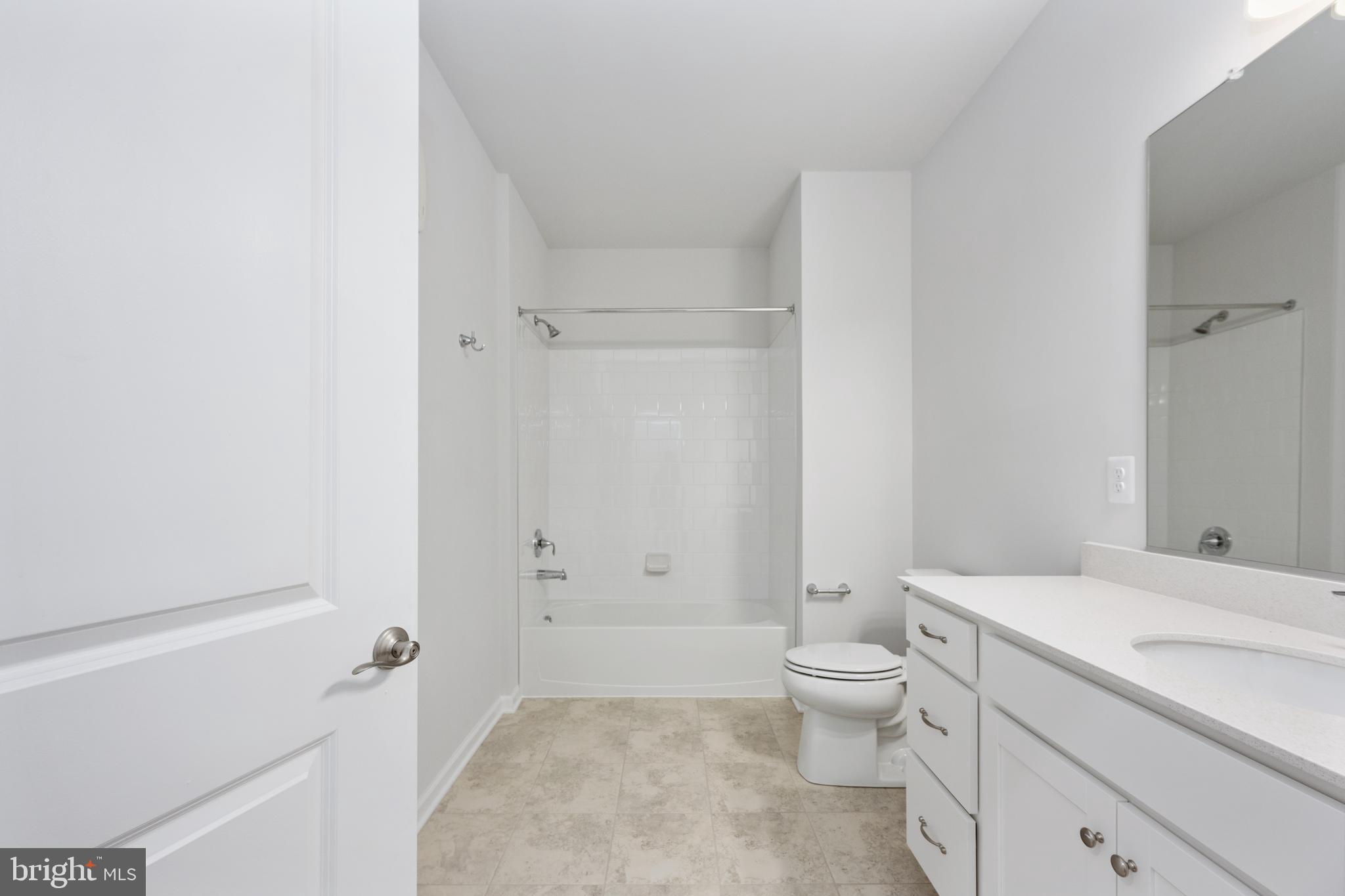 29 Hyssop Way, Unit 103 Stafford, VA 22554 - Photo 27 of 39 a bathroom with a sink a toilet and shower