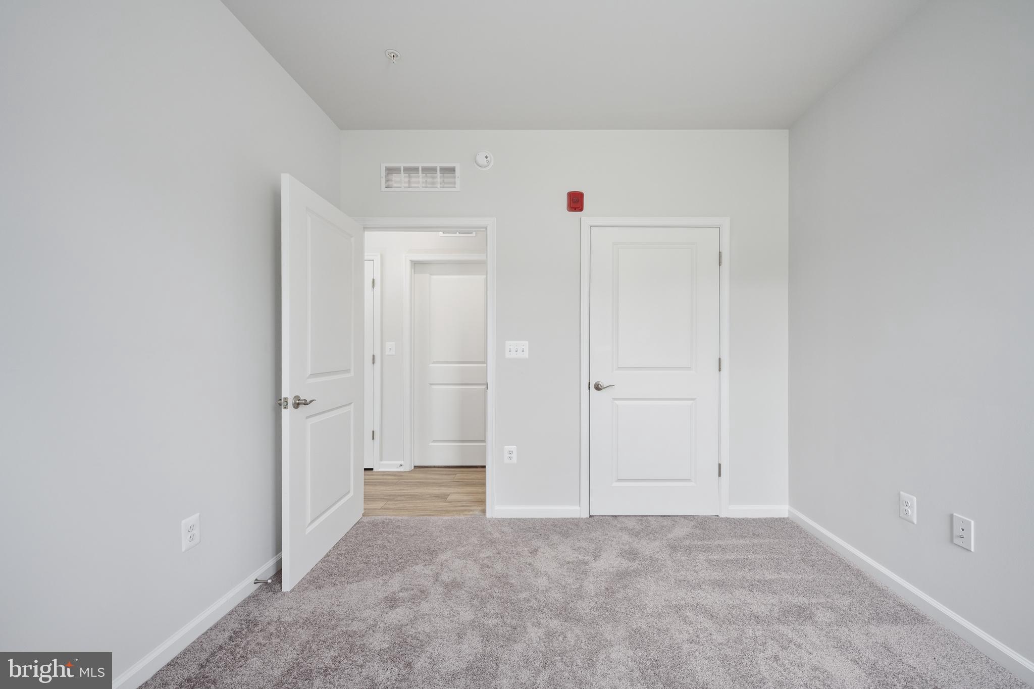 29 Hyssop Way, Unit 103 Stafford, VA 22554 - Photo 31 of 39 an empty room with cabinet