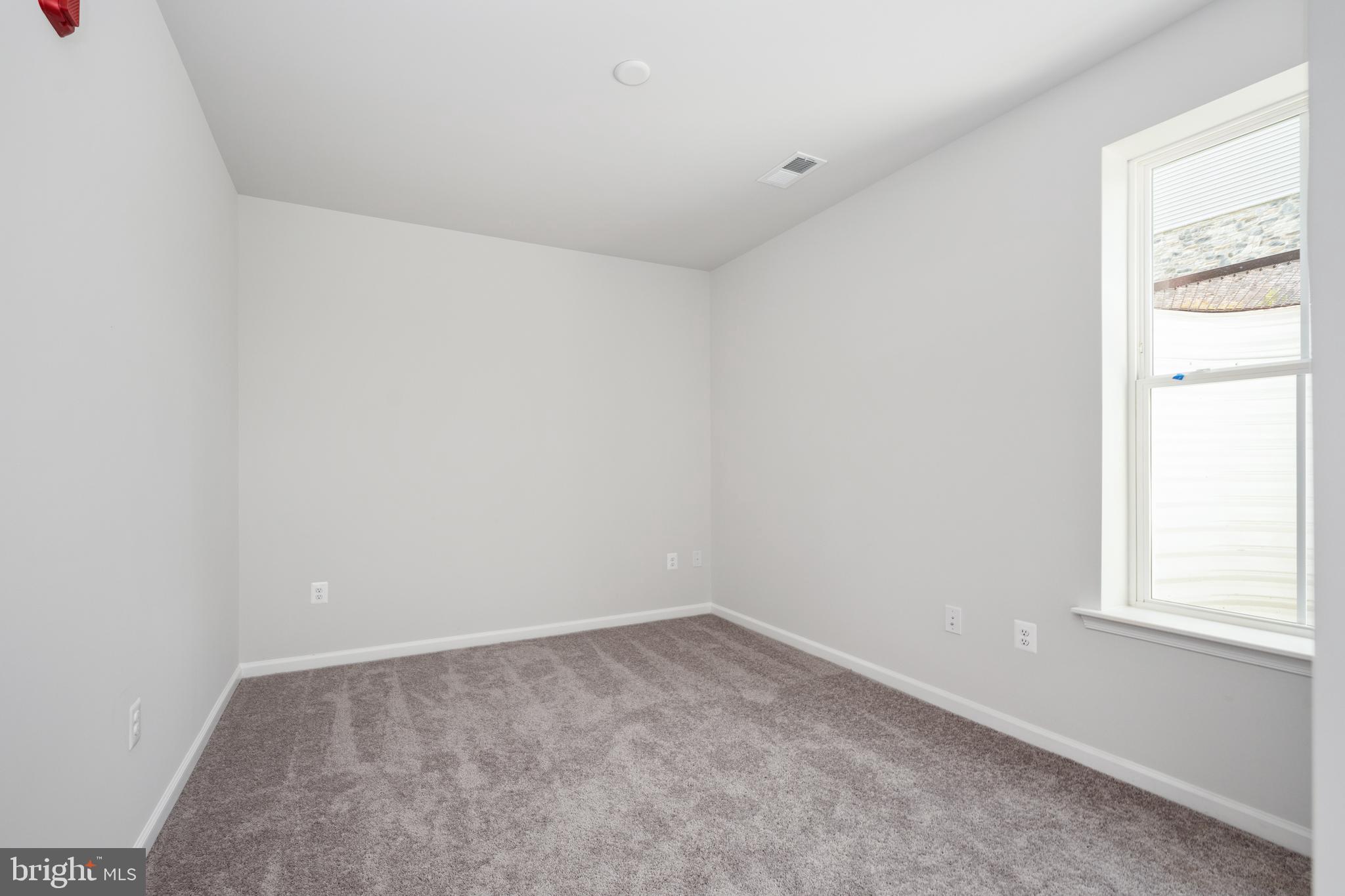 29 Hyssop Way, Unit 103 Stafford, VA 22554 - Photo 32 of 39 a view of an empty room and a window