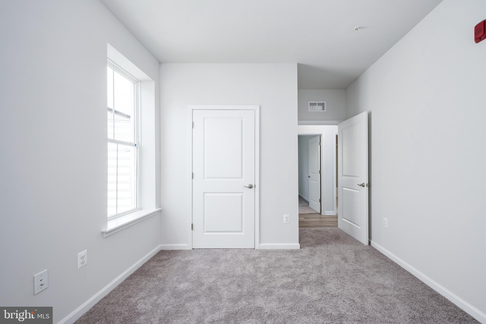 29 Hyssop Way, Unit 103 Stafford, VA 22554 - Photo 33 of 39 a view of an empty room with a window