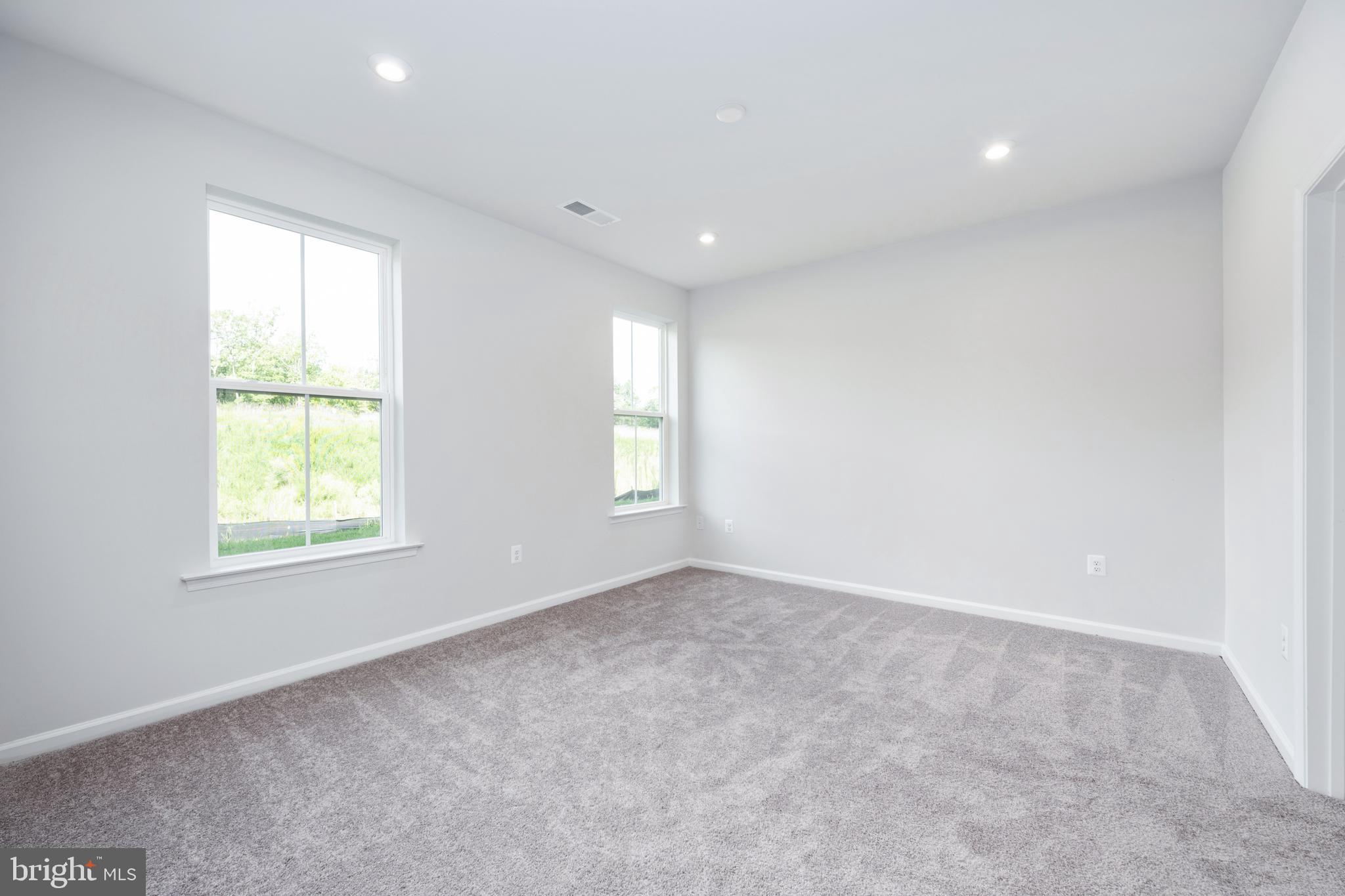 29 Hyssop Way, Unit 103 Stafford, VA 22554 - Photo 36 of 39 an empty room with windows