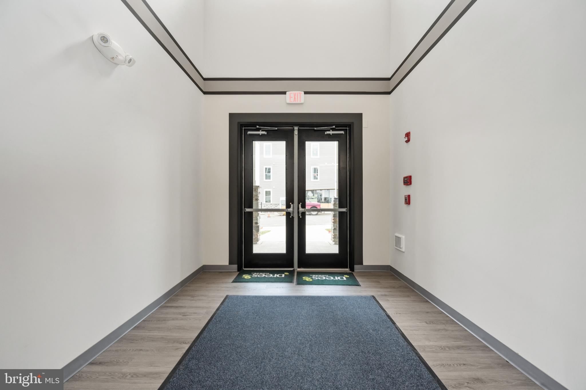 29 Hyssop Way, Unit 103 Stafford, VA 22554 - Photo 4 of 39 a view of entryway with wooden floor