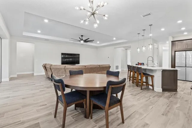 a bathroom with a shower and a sink