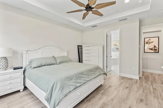 a en suite bathroom with a sink and a mirror