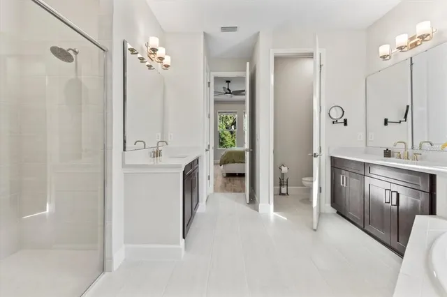 a bathroom with a bathtub and a toilet