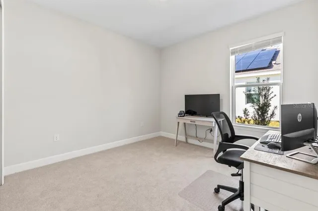 a utility room with sink dryer and washer
