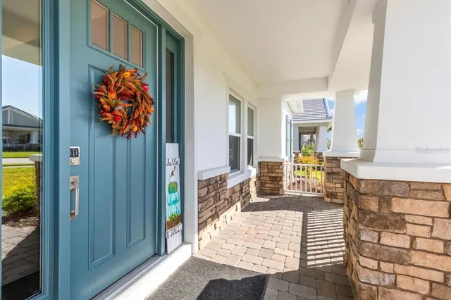 a view of a living room with wooden floor