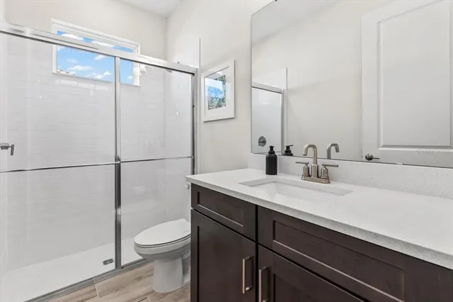 a view of a house with backyard and garden