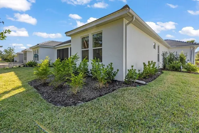 a view of a lake with a big yard