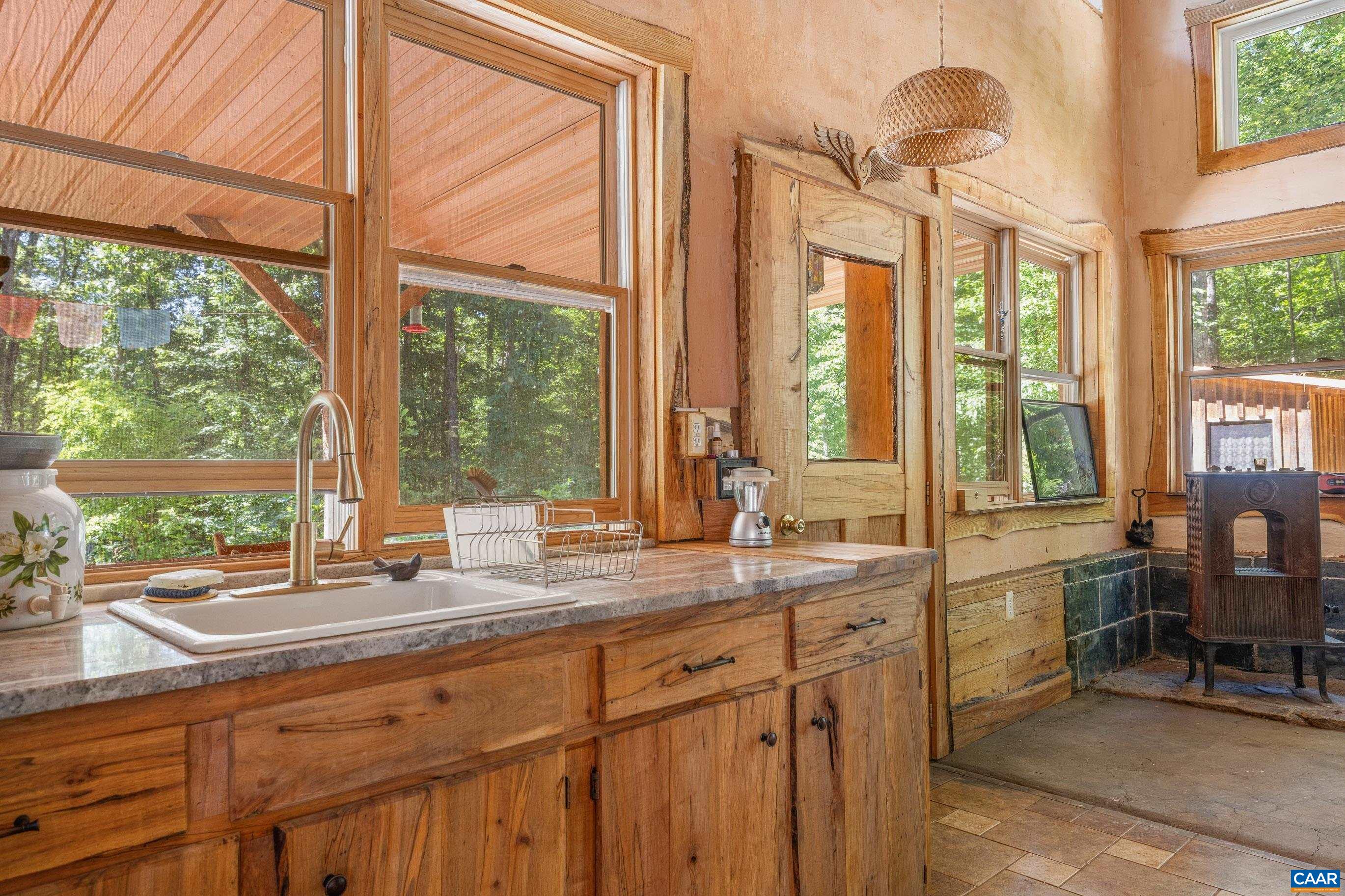 7676 Old Dominion Road Schuyler, VA 22969 - Photo 21 of 29 a room with sink and large window