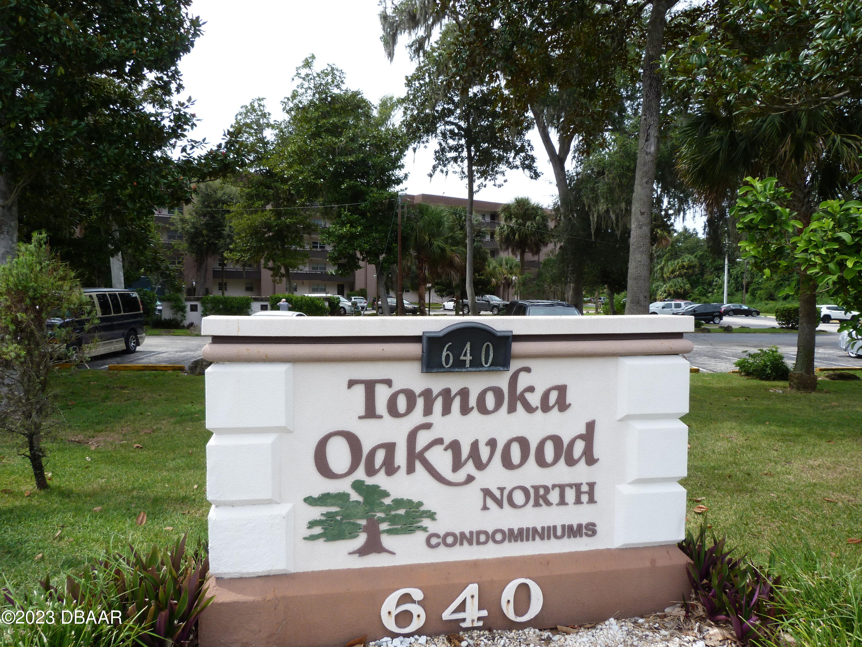 a view of a table with chairs and a yard