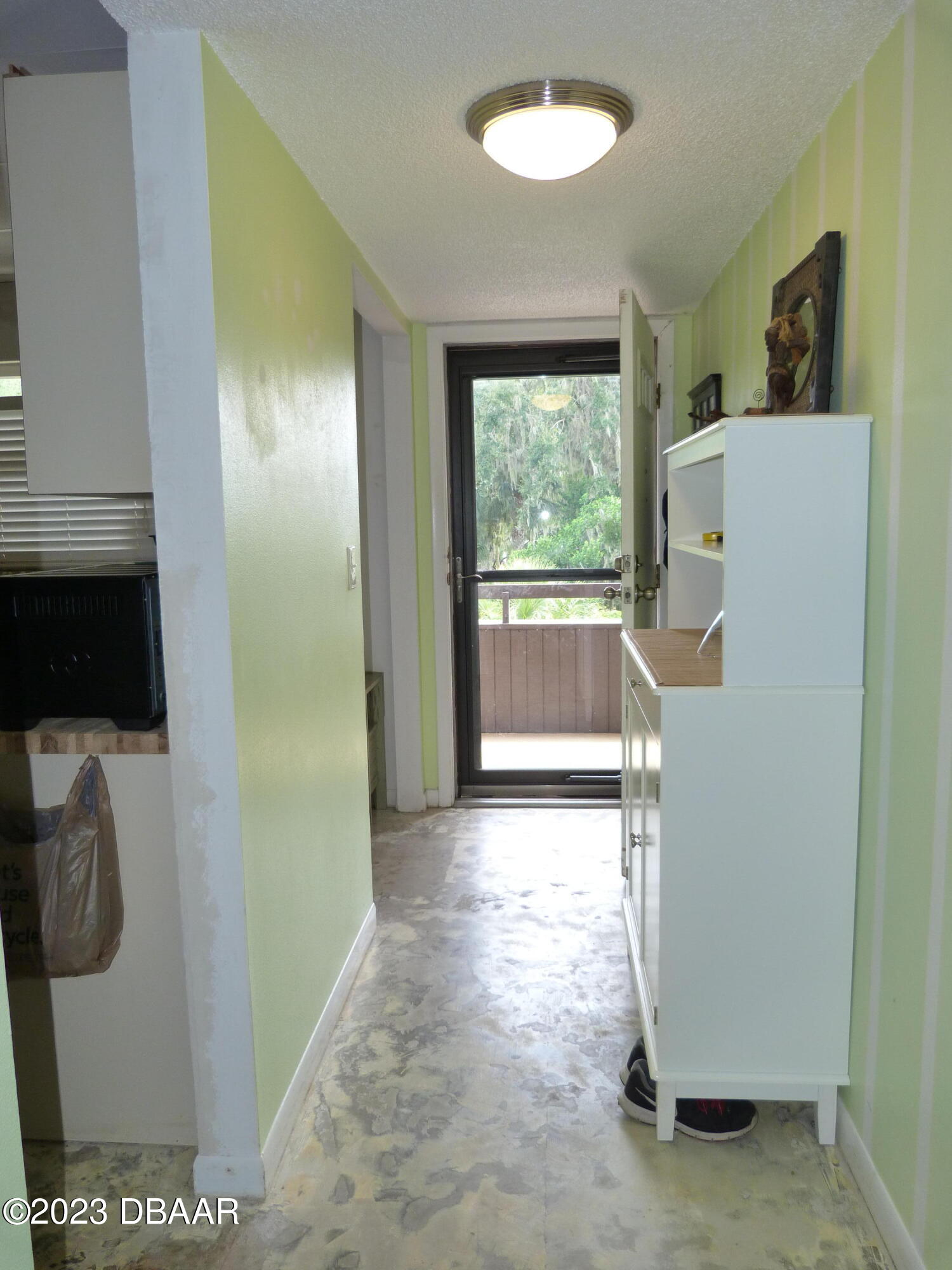 640 North Nova Road, Unit 303 Ormond Beach, FL 32174 - Photo 11 of 31 a view of a storage & utility room with a window