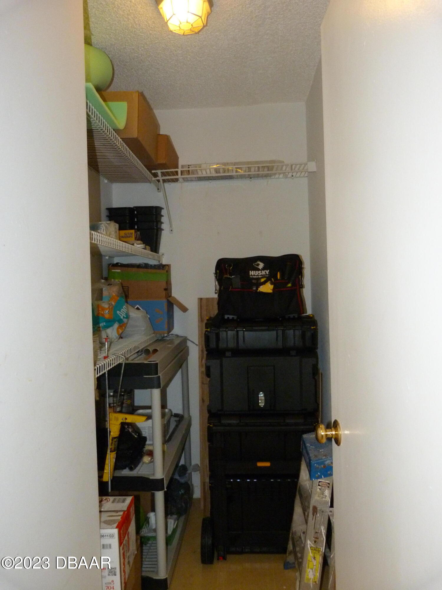 640 North Nova Road, Unit 303 Ormond Beach, FL 32174 - Photo 26 of 31 a room with storage and utility