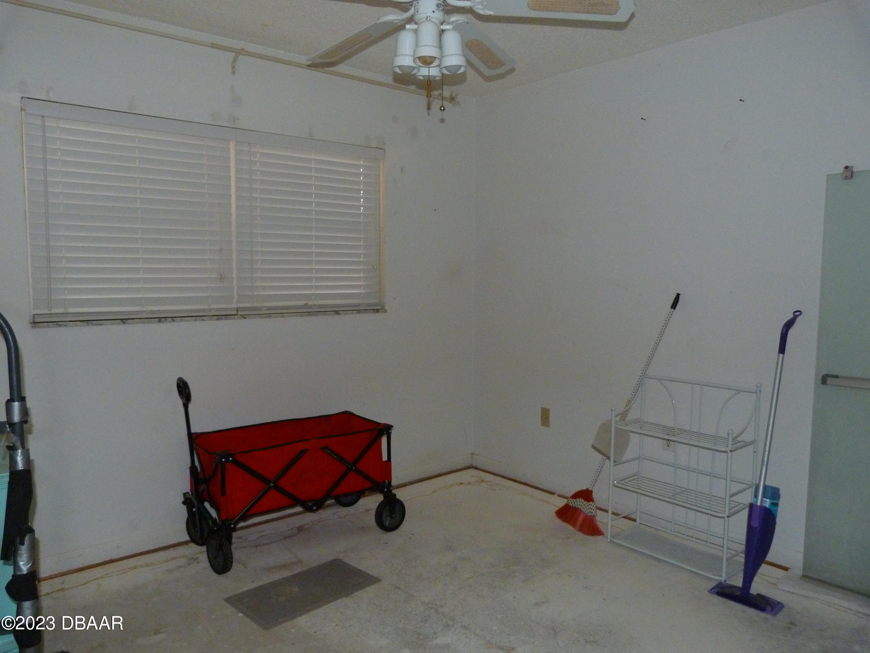 640 North Nova Road, Unit 303 Ormond Beach, FL 32174 - Photo 29 of 31 an empty room with windows