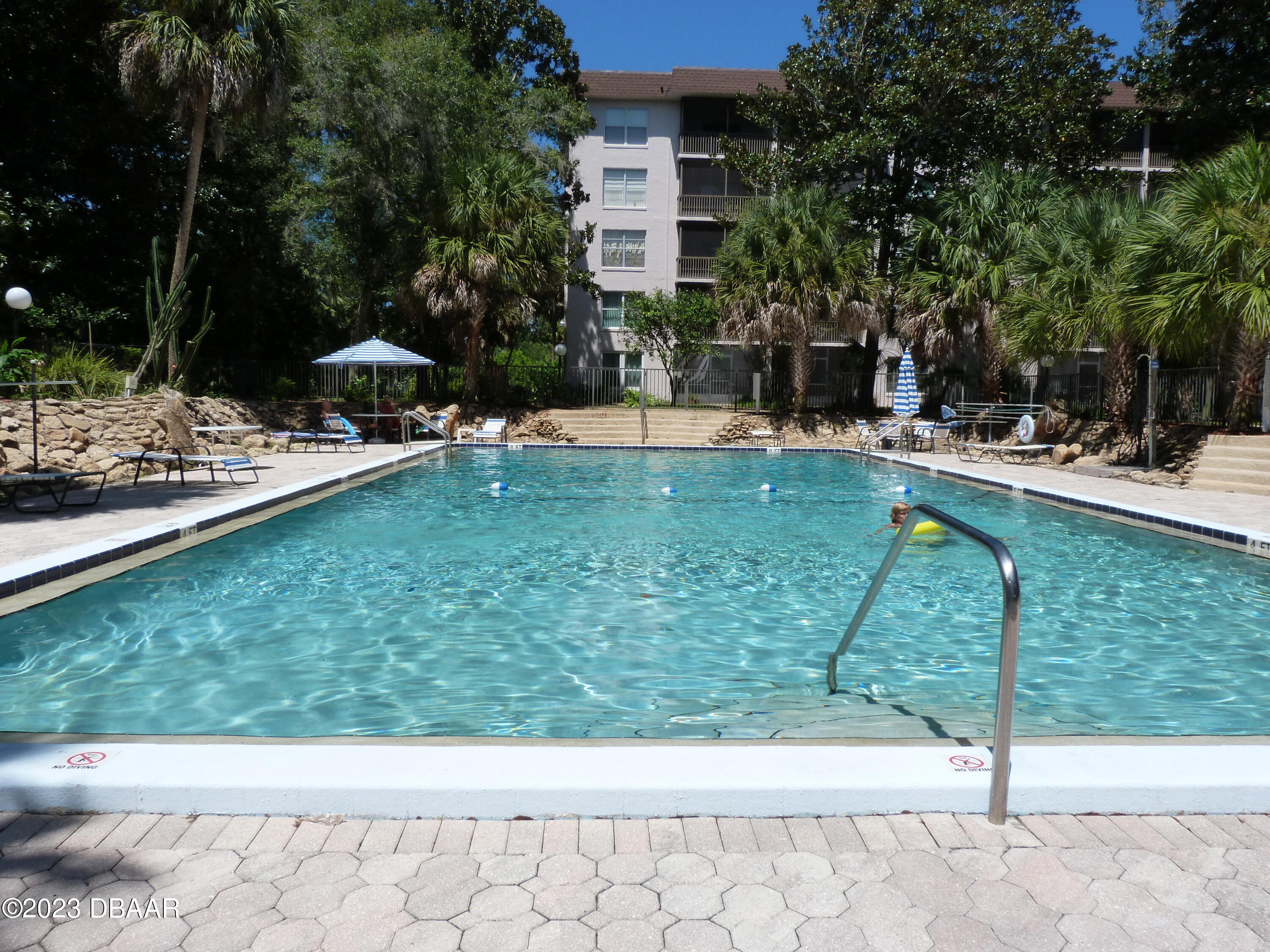 640 North Nova Road, Unit 303 Ormond Beach, FL 32174 - Photo 7 of 31 a view of a backyard