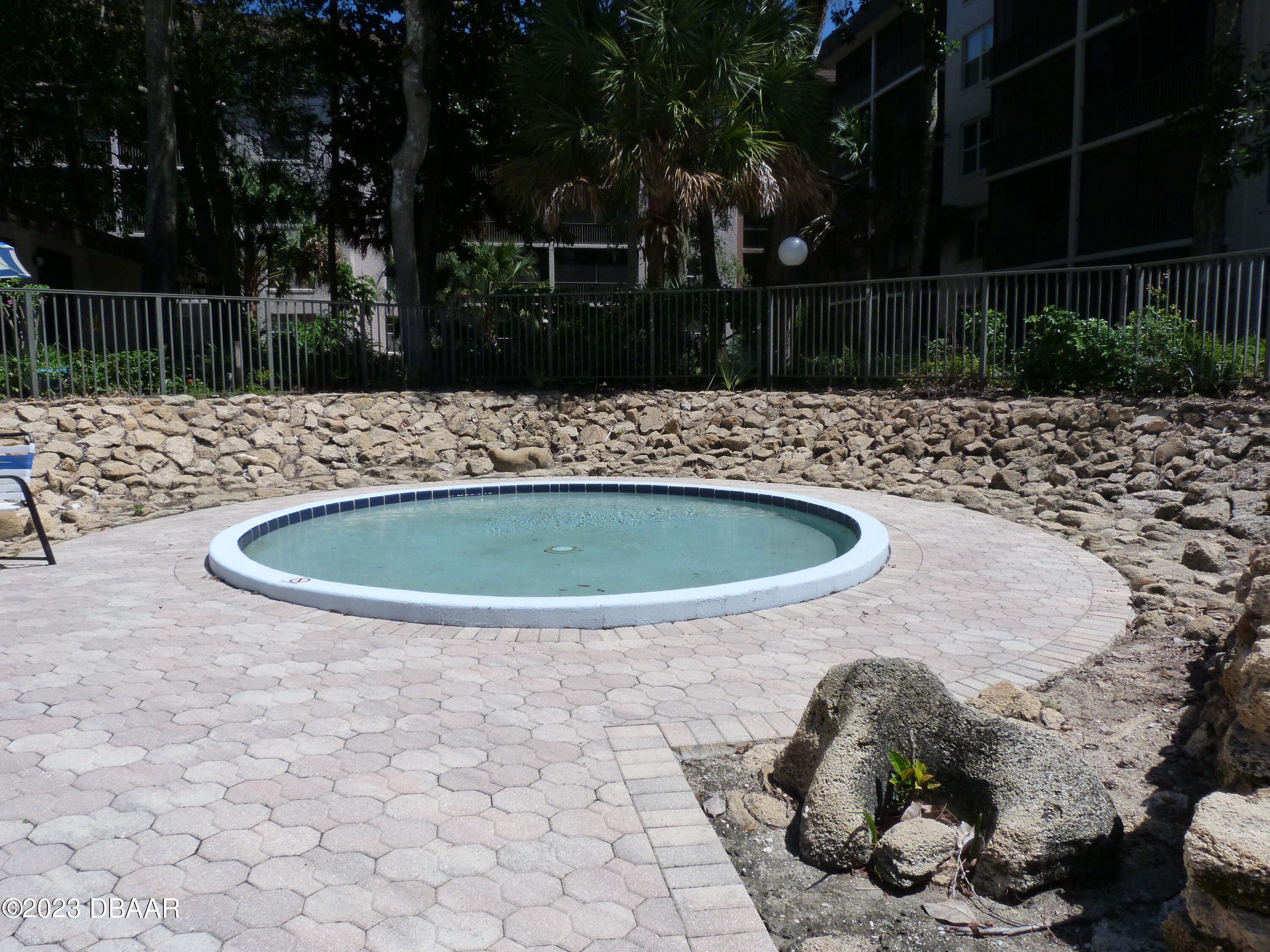 640 North Nova Road, Unit 303 Ormond Beach, FL 32174 - Photo 8 of 31 a view of fountain in a backyard