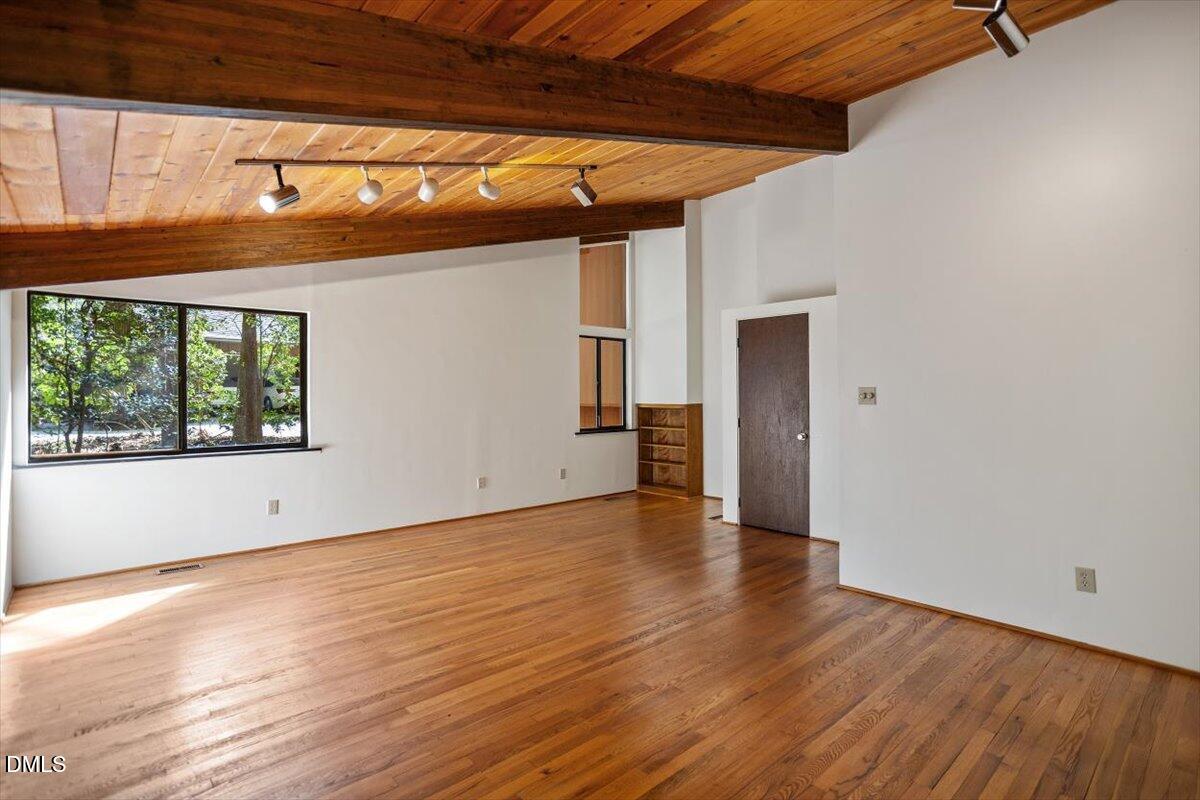 2903 Montgomery Street Durham, NC 27705 - Photo 30 of 37 an empty room with wooden floor and windows
