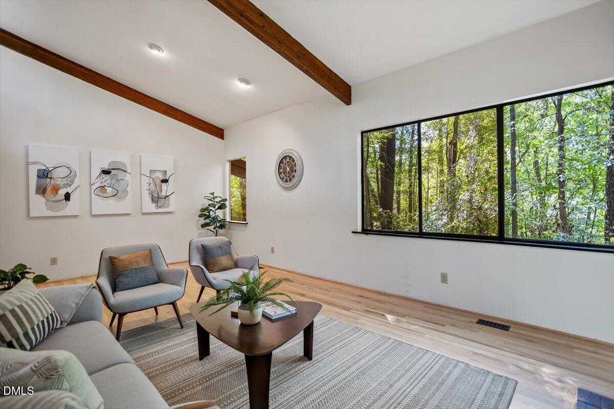2903 Montgomery Street Durham, NC 27705 - Photo 8 of 37 a living room with furniture and a large window