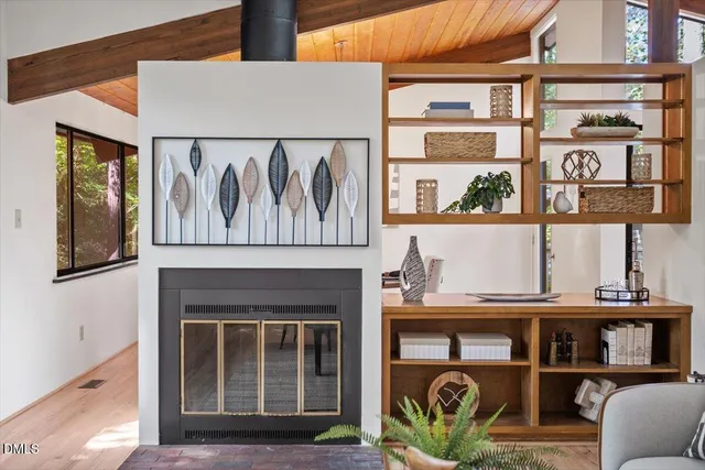 a livingroom with furniture and window