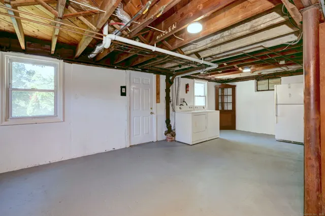 a view of a room with wooden walls