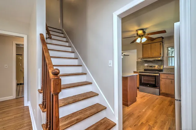a view of a kitchen from the hallway