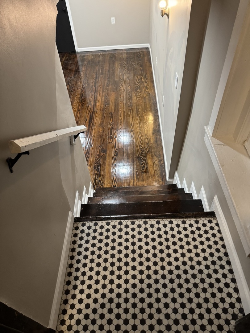 6840 South Champlain Avenue, Unit G Chicago, IL 60637 - Photo 2 of 11 a view of a black gate