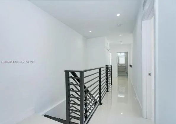 a bathroom with a toilet a sink and shower