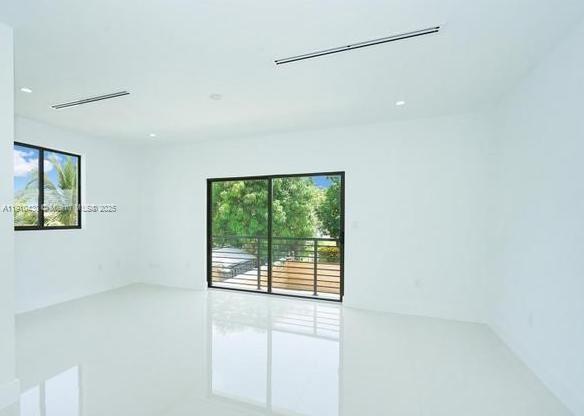 3024 Southwest 16th Terrace, Unit 3024 Miami, FL 33145 - Photo 12 of 16 a view of a room that has a window in it