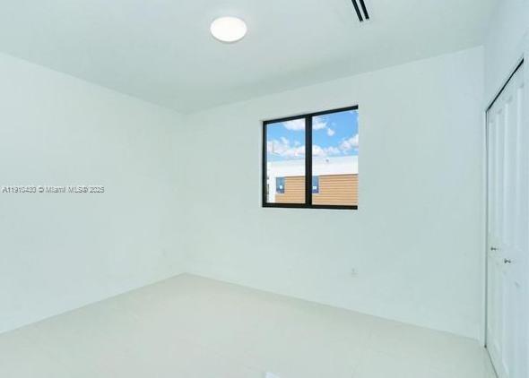 3024 Southwest 16th Terrace, Unit 3024 Miami, FL 33145 - Photo 15 of 16 a view of a small space with a window