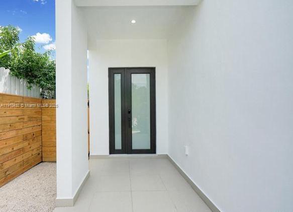 3024 Southwest 16th Terrace, Unit 3024 Miami, FL 33145 - Photo 2 of 16 a view of a hallway