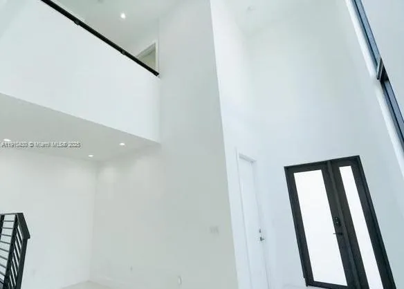 a view of a room that has a window in it