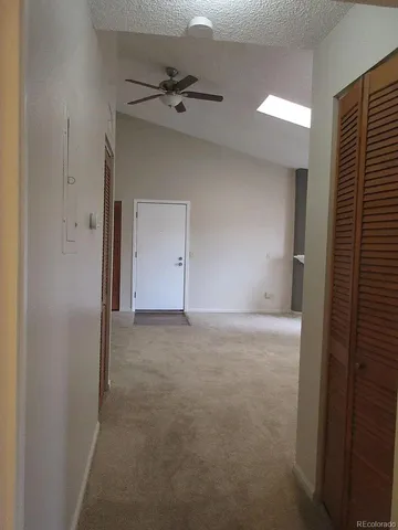 a kitchen with stainless steel appliances granite countertop a refrigerator sink and cabinets