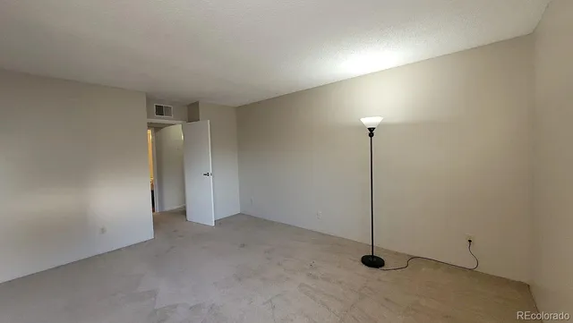 a outdoor space with lots of palm trees