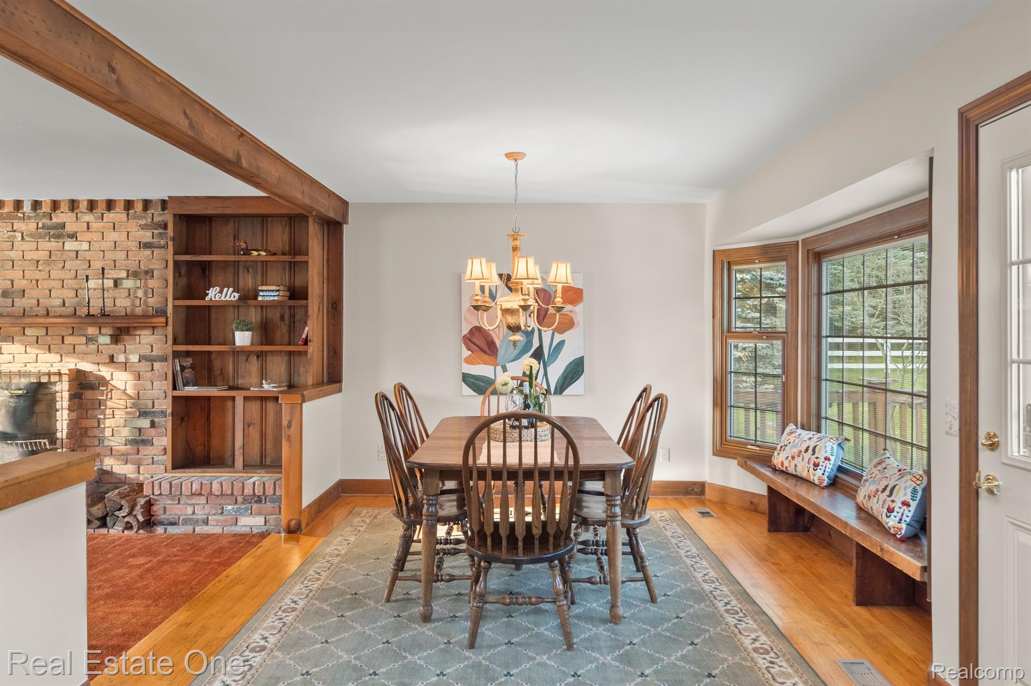 11260 Hartland Road Fenton, MI 48430 - Photo 16 of 73 Dining space w/rm for large table. Note bench.