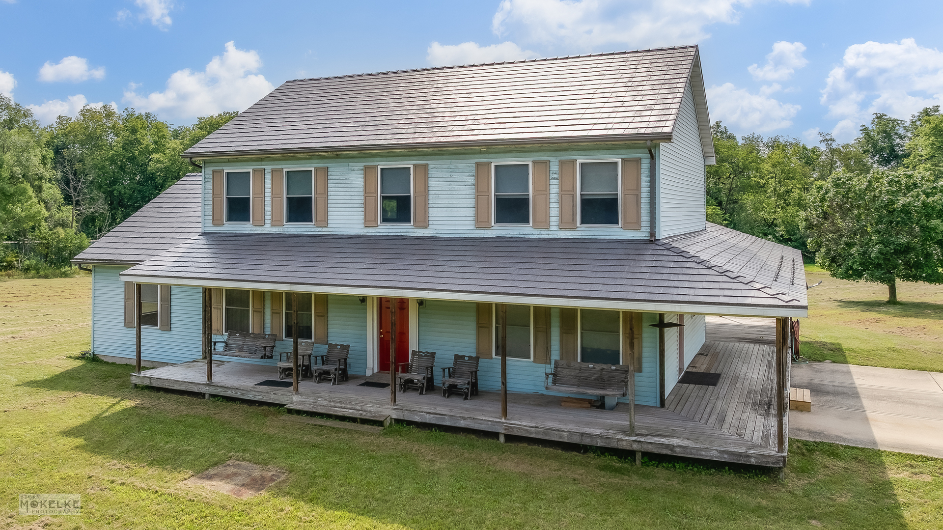 8124 A Finnie Road Newark, IL 60541 - Photo 2 of 33 a view of house with a yard potted plants and a table