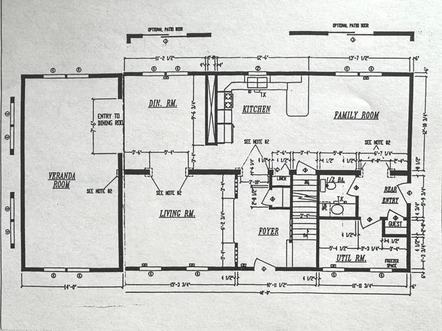 a picture of a bathroom with a shower