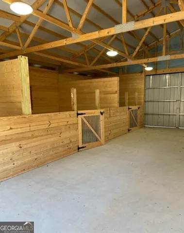 a view of an empty room with stairs