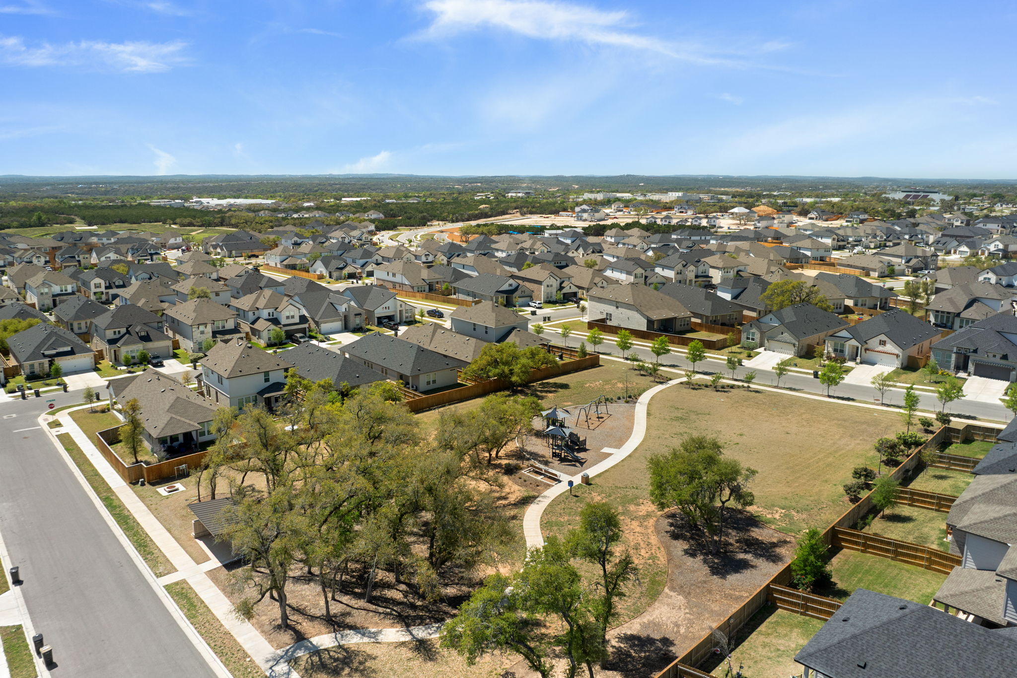 256 Comfort Maple Lane Dripping Springs, TX 78620 - Photo 36 of 39 Located in charming Dripping Springs, you’ll enjoy the perfect balance of Hill Country beauty and modern convenience, with downtown Austin only about 20 miles away.