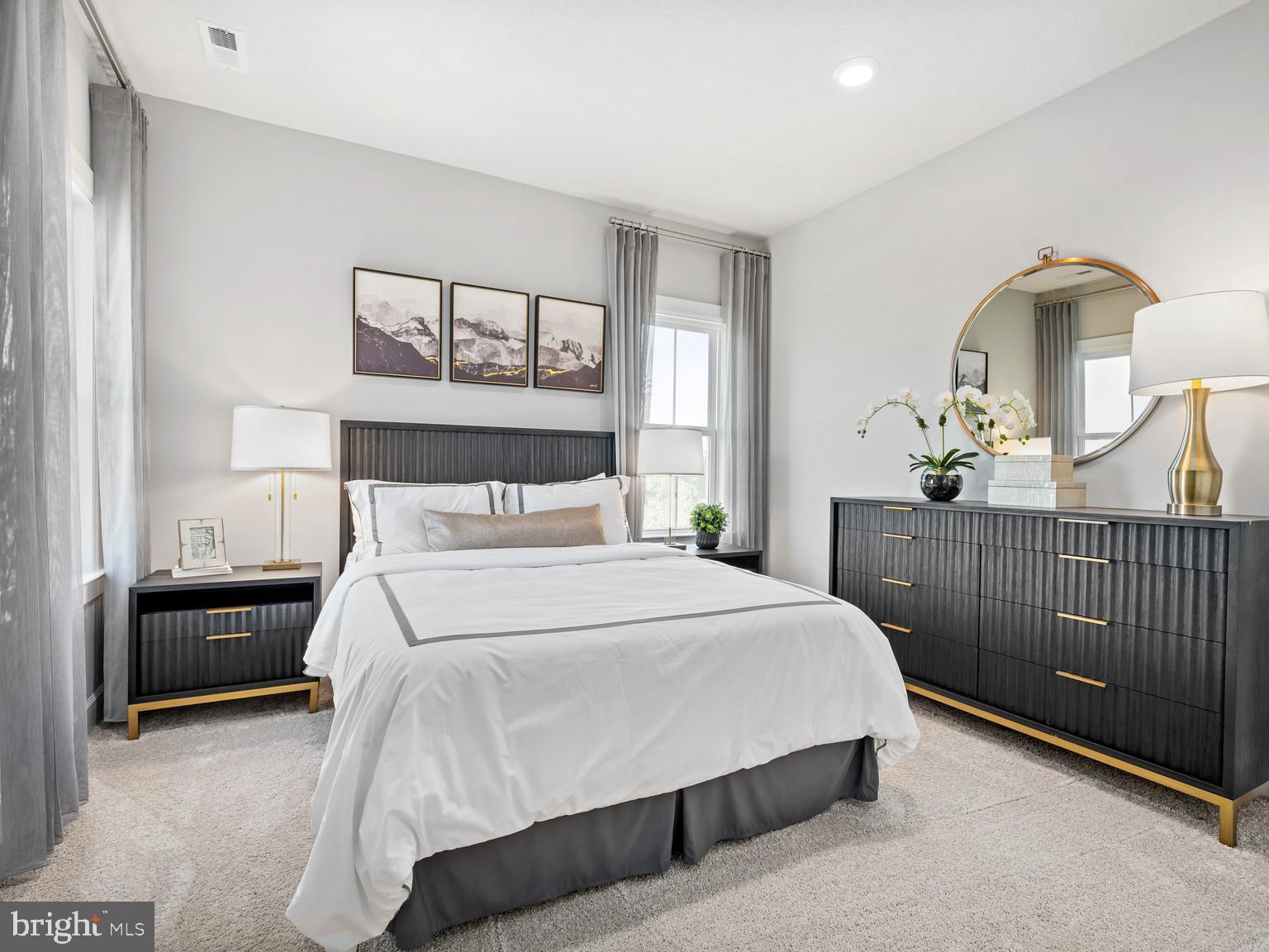 1765 Mill Branch Drive Laurel, MD 20708 - Photo 5 of 12 a bedroom with a bed and a painting on the wall