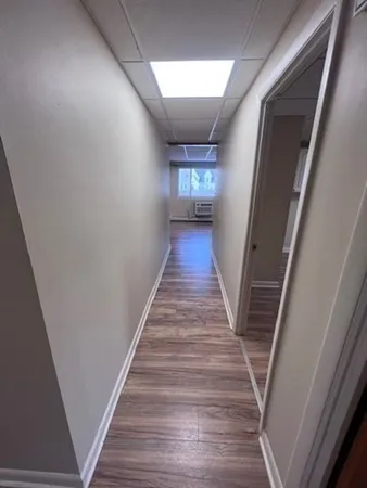 a view of an empty room and window