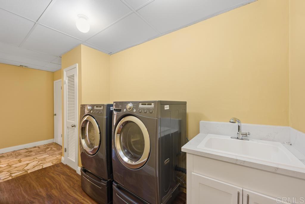 1131 Rainbow Valley Boulevard Fallbrook, CA 92028 - Photo 19 of 73 a utility room with dryer and washer